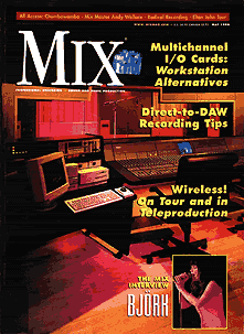 A magazine cover with various electronic equipment on it.